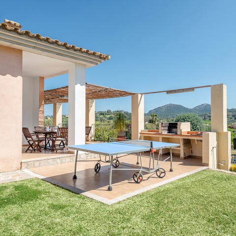Have a game of table tennis in the Balearic sun