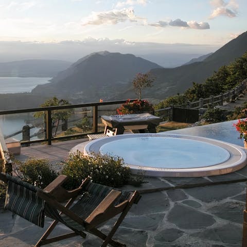 Soak in the hot tub while you admire the breathtaking views surrounding you