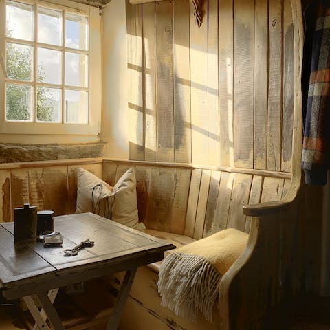 Start your day with a warm cup of tea in the cosy dining nook as the morning sun floods in through the window 
