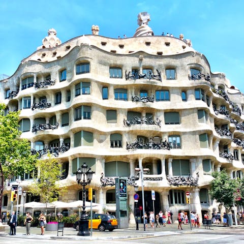 Admire Gaudi's iconic La Pedrera-Casa Milà, a short walk away