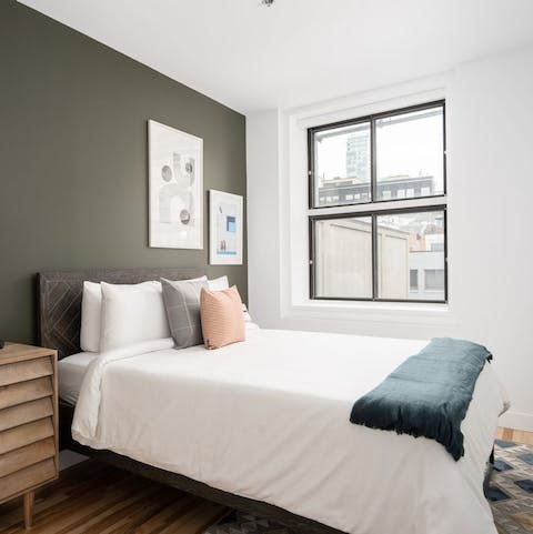 Get some rest in the stylish bedrooms after a busy day exploring Montréal 