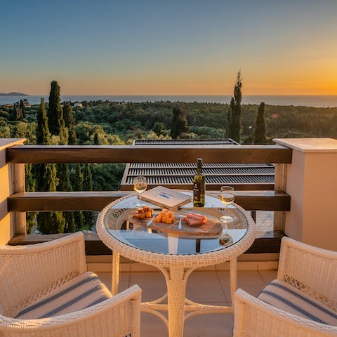 Watch the sun set over the Ionian sea with a platter of local nibbles