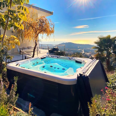 Soak in the Jacuzzi as the sun starts to set