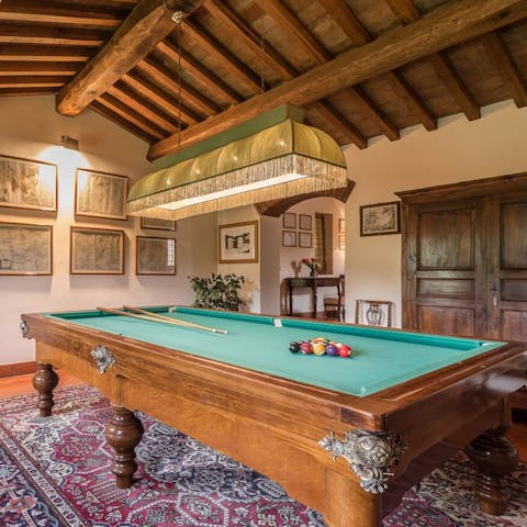 Have a game of pool in possibly the grandest room to ever have a pool table