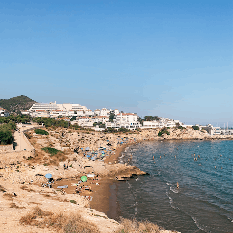 Drive over to the seaside resort of Sitges in fifteen minutes and find a quiet cove 