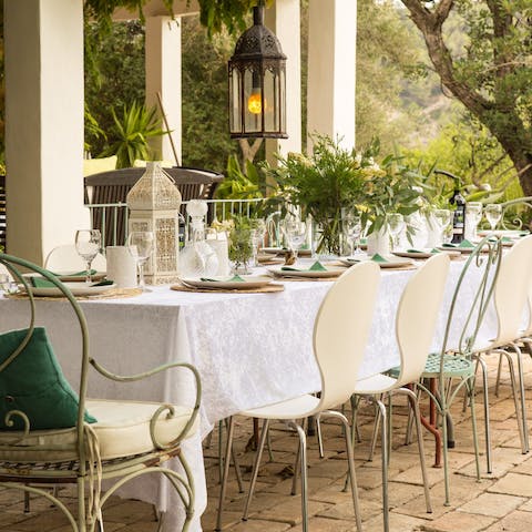 Gather everybody together to dine alfresco on the home's covered terrace