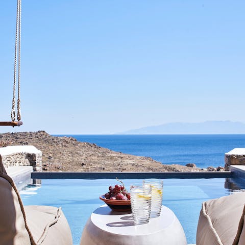 Spend hours gazing out at the mesmerising Aegean Sea