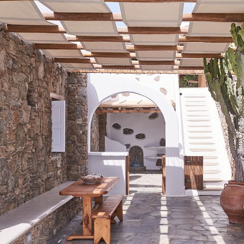 Start the day with a Greek coffee on your private walled veranda