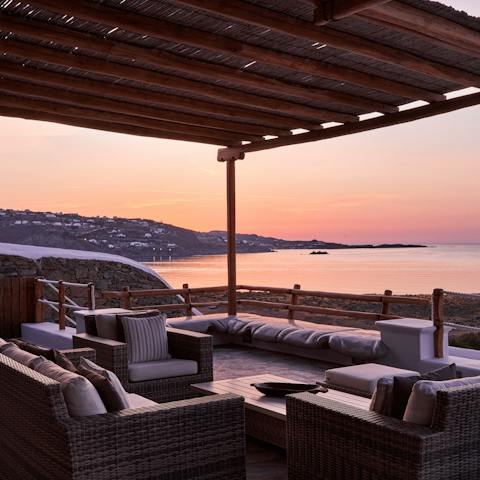 Watch the sun set from the comfy outdoor seating nook
