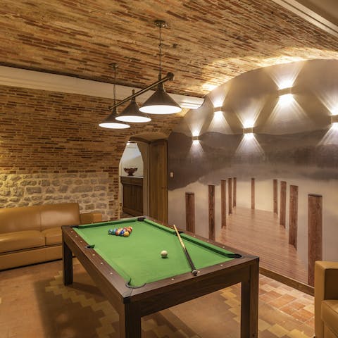Get a tournament going at the pool table in the basement