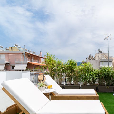 Sun yourself on the private terrace's deck chairs