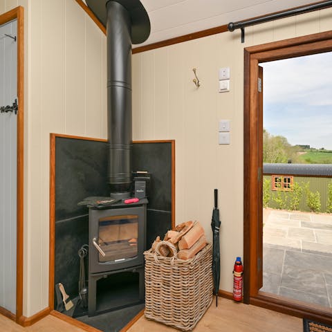 Put some logs into the wood-burning stove and feel toasty even on cold evenings