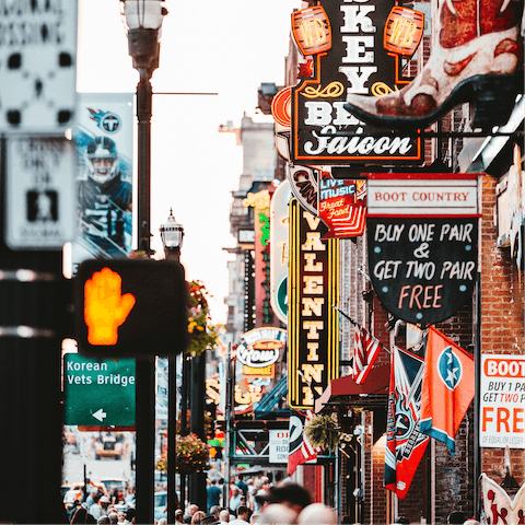 Explore Nashville's thriving music scene – Broadway and Printers Alley are a ten-minute drive away
