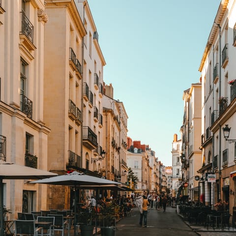 Take a stroll through the quintessentially French streets and stop by local shops and restaurants 