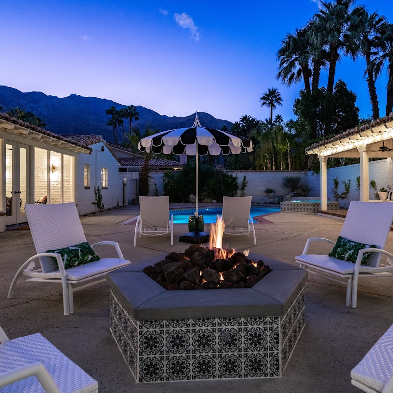 Cosy up around the fire pit as darkness falls