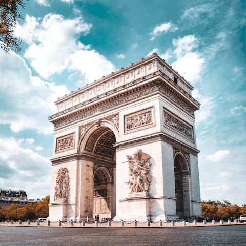 See the majestic Arc de Triomphe up close,  easily reachable on foot