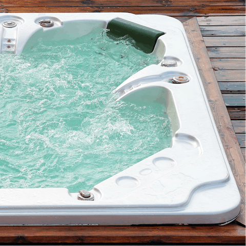 Unwind in the hot tub after a day of exploring the local countryside