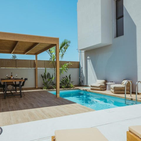 Spend a leisurely afternoon relaxing by the private pool