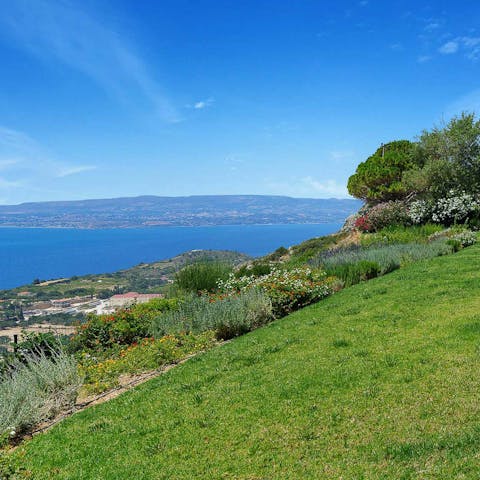 Take in scenic views over the Ionian Sea from the garden