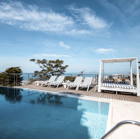Relax by the pool with beautiful views overlooking the Athens Riviera