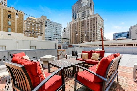 Admire panoramic city views from the rooftop deck