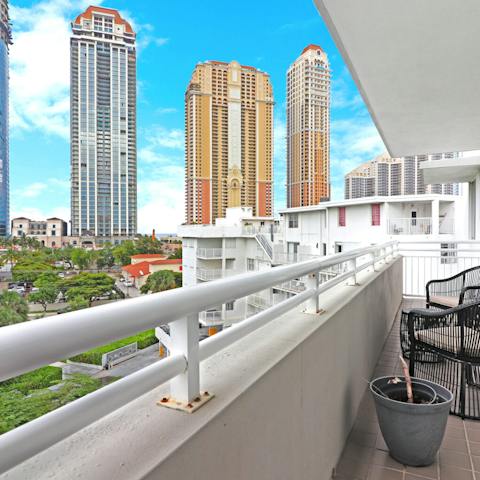 Take in the views over Sunny Isles from the balcony