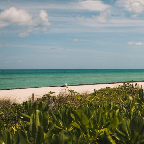 Spend the day on the stunning white sands of Sunny Isles Beach – a four-minute walk away