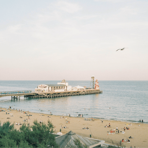 Grab your towel and spend days on Bournemouth Beach, a short drive away 