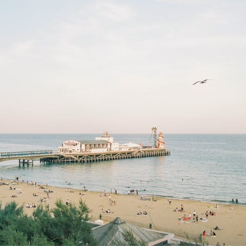 Grab your towel and spend days on Bournemouth Beach, a short drive away