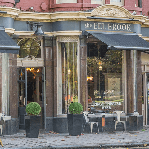 Sip a gin and tonic in a classic English pub in Fulham