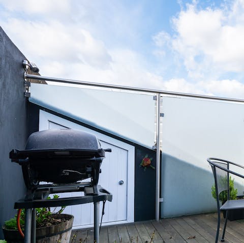 Light up the barbecue for a balmy evening on the roof terrace