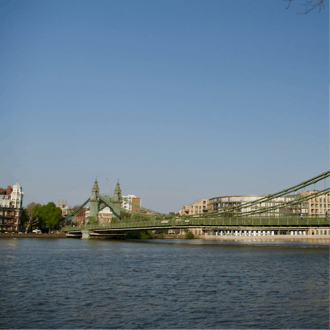 Stroll along the riverside to Hammersmith Bridge to take in some local sights