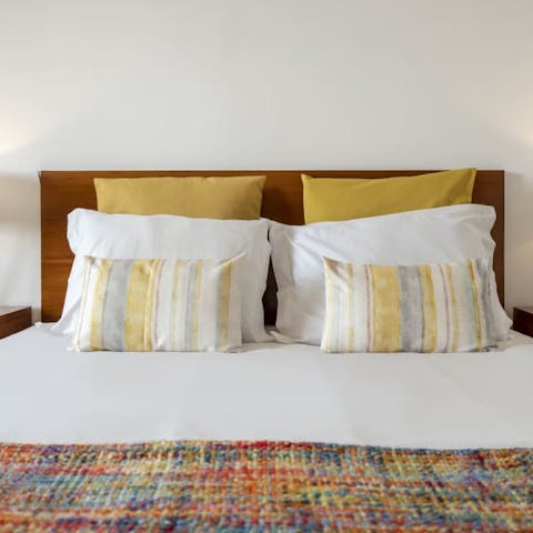 Snuggle up in the comfy bed and feel yourself unwind after a long day of exploring
