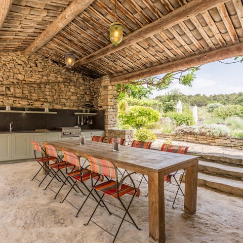 Prepare a plate of ratatouille in the outdoor kitchen