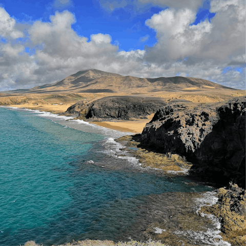 Discover Lanzarote's stunning coastline from this spot in Playa Blanca