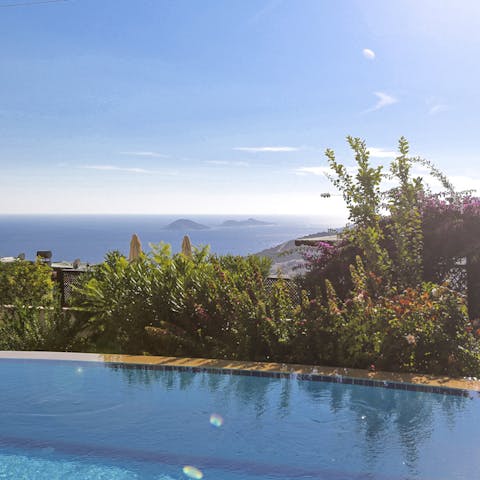 Swim laps in the private pool, only stopping to take in the breathtaking views of the coast