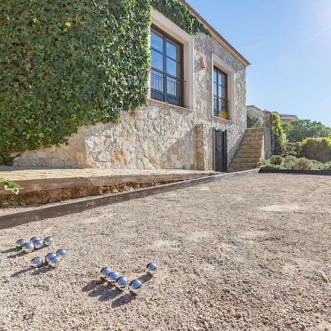 Play a few games of petanque as the afternoon sun declines