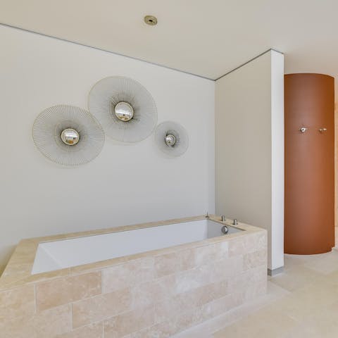 Soothe the body and mind in the dreamy indoor hot tub