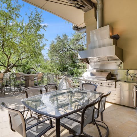 Sizzle some burgers on the BBQ and enjoy each bite on the outdoor table