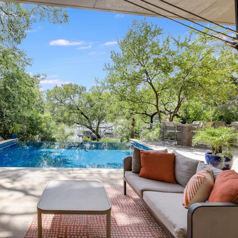 Take a dip in the pool after a day exploring Austin