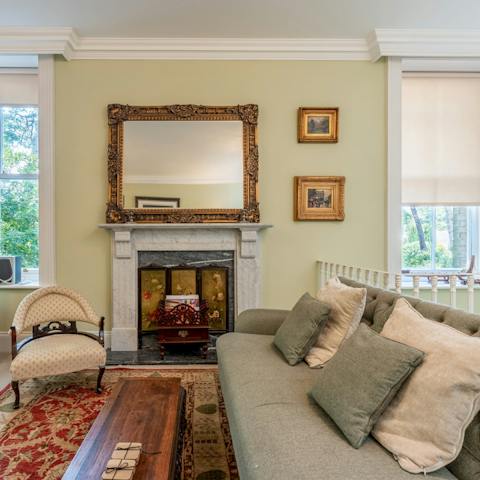Relax in the charming living space with original period details