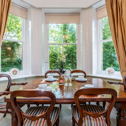 Sit down for a celebratory meal at the window-side dining table