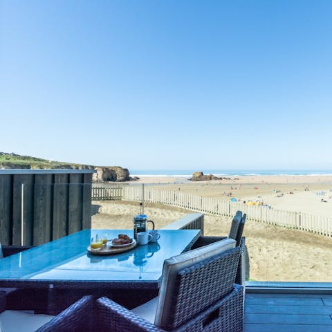 Enjoy a seafood lunch on your private balcony as you take in the vistas over Perranporth Beach