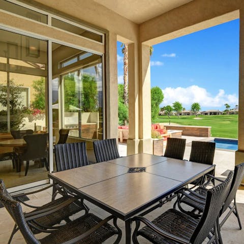 Gather on the patio for an alfresco meal in the shade