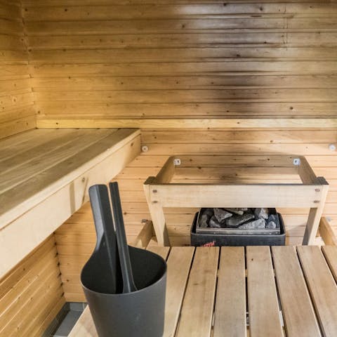 Relax and unwind in the private sauna