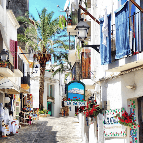 Go for a stroll through the cobbled streets of Ibiza Town, a fifteen-minute drive from home