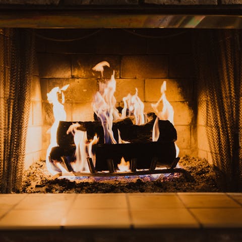 Snuggle up by the fire to keep warm when temperatures drop