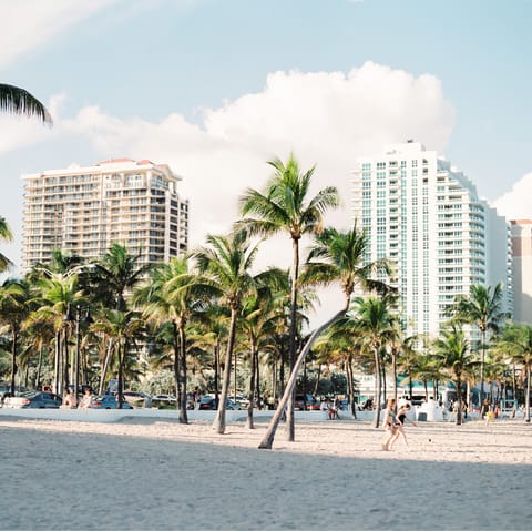 Feel the sand beneath your feet on Miami Beach – a twenty-minute drive away