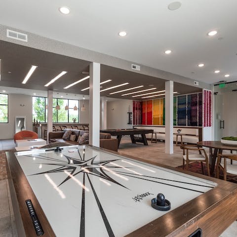 Play some air hockey in the lounge