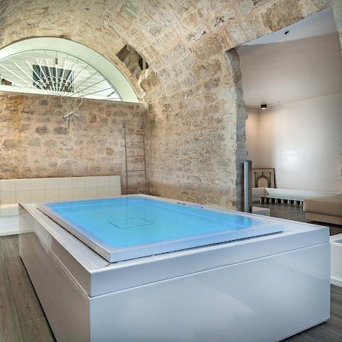 Unwind in your very own wellness room, complete with a private jacuzzi and sauna